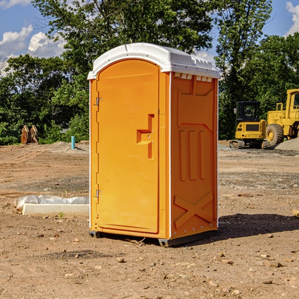 how often are the portable restrooms cleaned and serviced during a rental period in Roopville GA